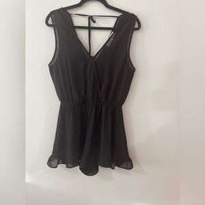 ASTR Romper Sleeveless Black V Neck Ruffle Hem  Size Small
